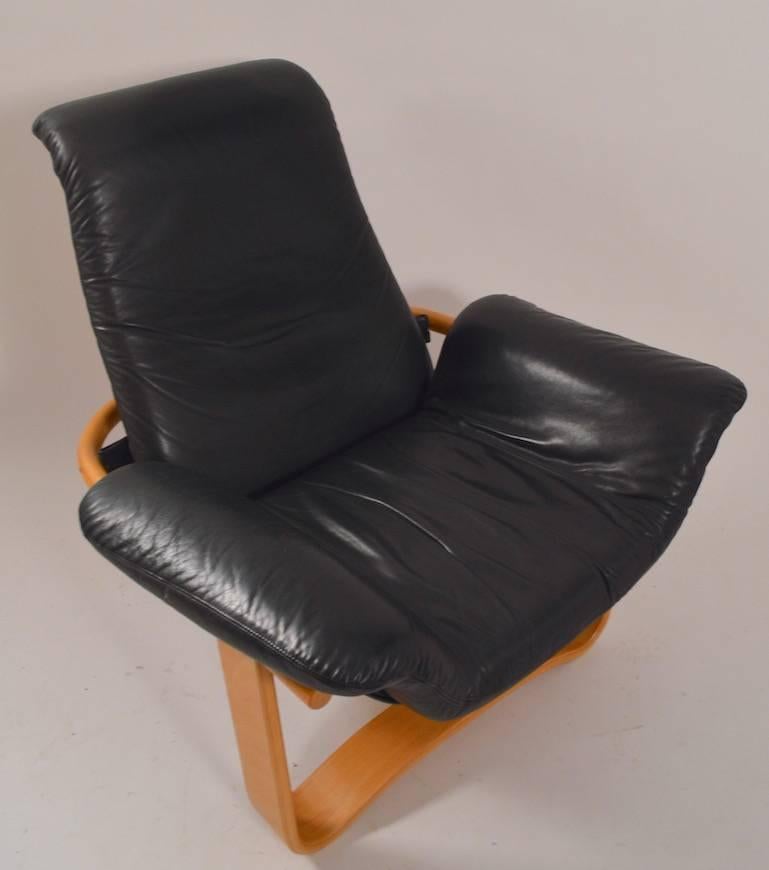 Mid-Century Modern Leather and Wood Manta Chair and Ottoman by Ingmar Relling for Westnofa