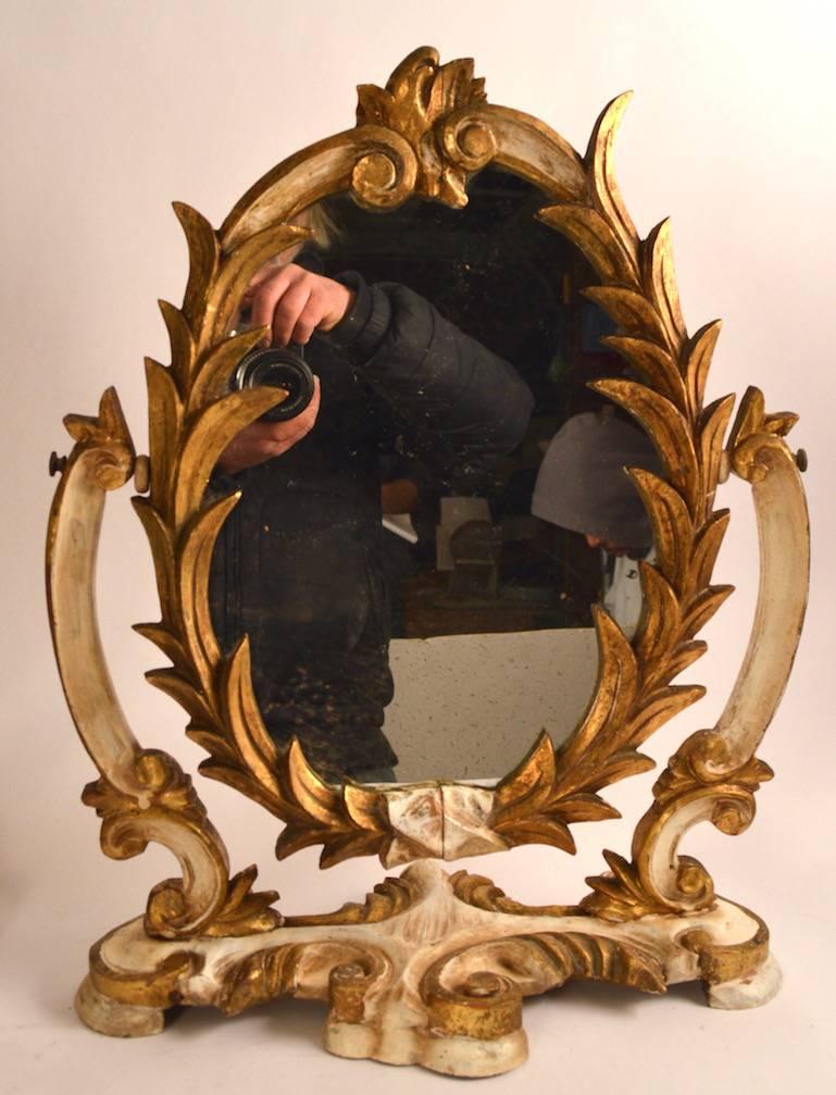 Rococo Two Venetian Parcel-Gilt Easel Mirrors For Sale