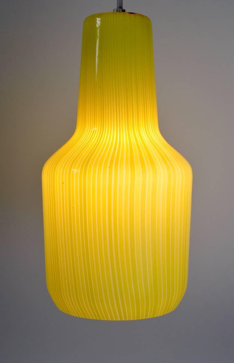 Nice yellow stripped hanging shade by Venini. New rewired comes with approximately 70