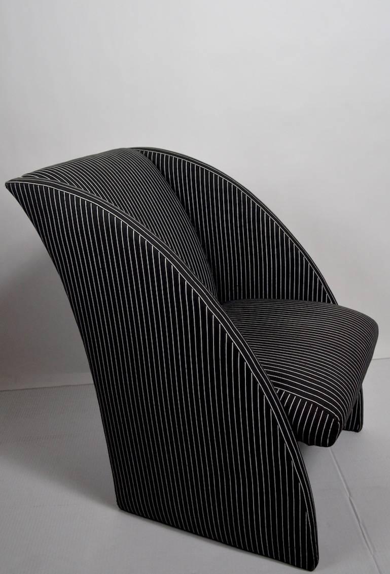 Dramatic form Postmodern chair by Thayer Coggin. This example is in original condition, the fabric has a couple of spots and stains, normal and consistent with age. Bears original TC labels on the bottom, possibly a Milo Baughman design.
