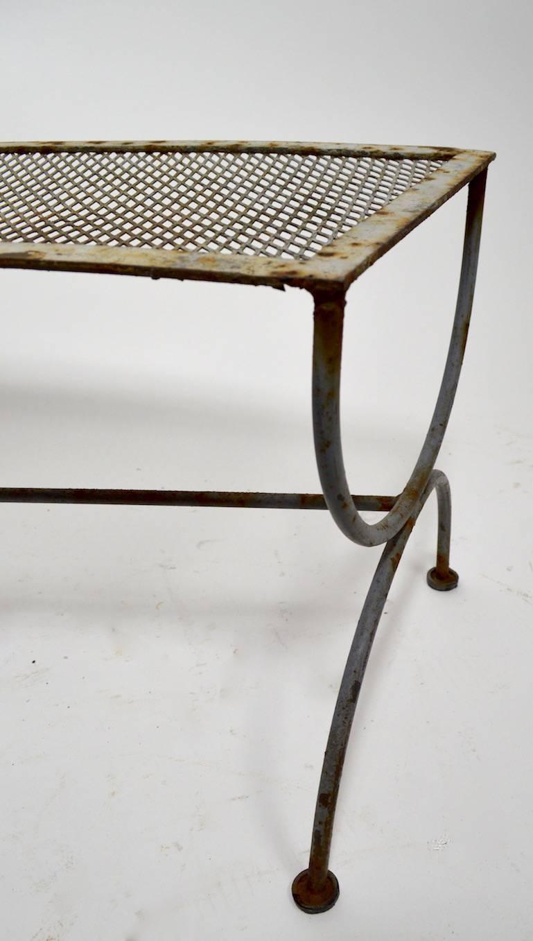 Semi circular metal bench by Salterini in the radar pattern. Bench shows cosmetic wear, normal and consistent with age, and outdoor use. Structurally sound, no breaks, welds, or repairs. Please view the other Salterini items we have listed from this