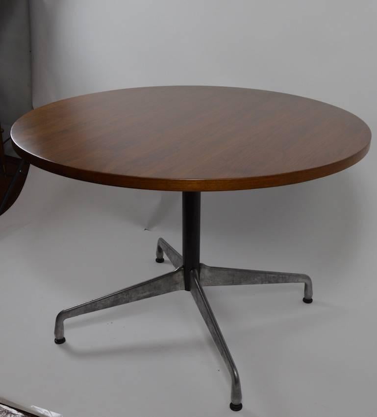 Classic Eames design, Herman Miller production aluminium Group wood top aluminium base circular dining tables. Nice diminutive scale, comfortably seats four. We have had the tops professionally refinished, clean, ready to use condition.
We have two