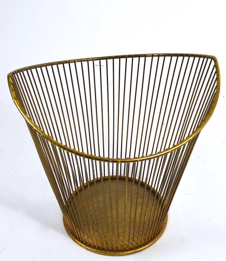 Glamorous brass plate wire rod construction waste can. Hollywood Regency style decorative objet, fun and chic.