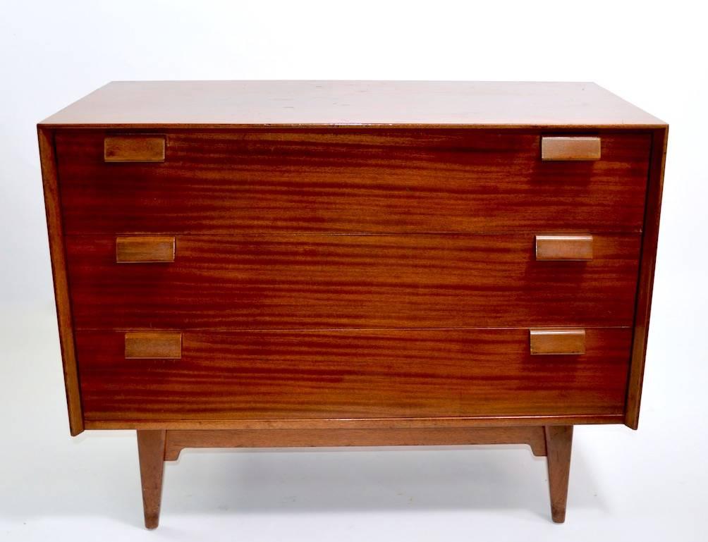 Rare pair of three-drawer dressers, designed by Jens Risom for Risom Furniture. Hard to find form, not usually found in pairs. Both shown wear to finish and would benefit from refinishing, selling as is, and as found.
We offer custom restoration