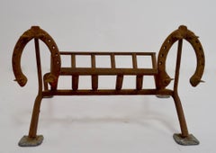Folky Fireplace Grate with Horseshoe Decorations