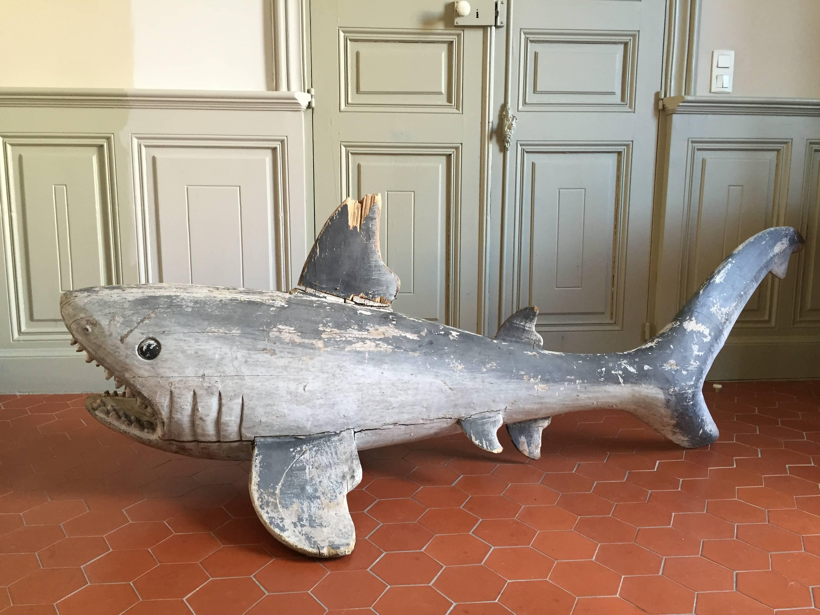 Unique and impressive shark sculpture in massive wood.
Nice blue grey patina and realistic details.
Manufactured by a craftsman from the region of Bordeaux, France, circa 1920.