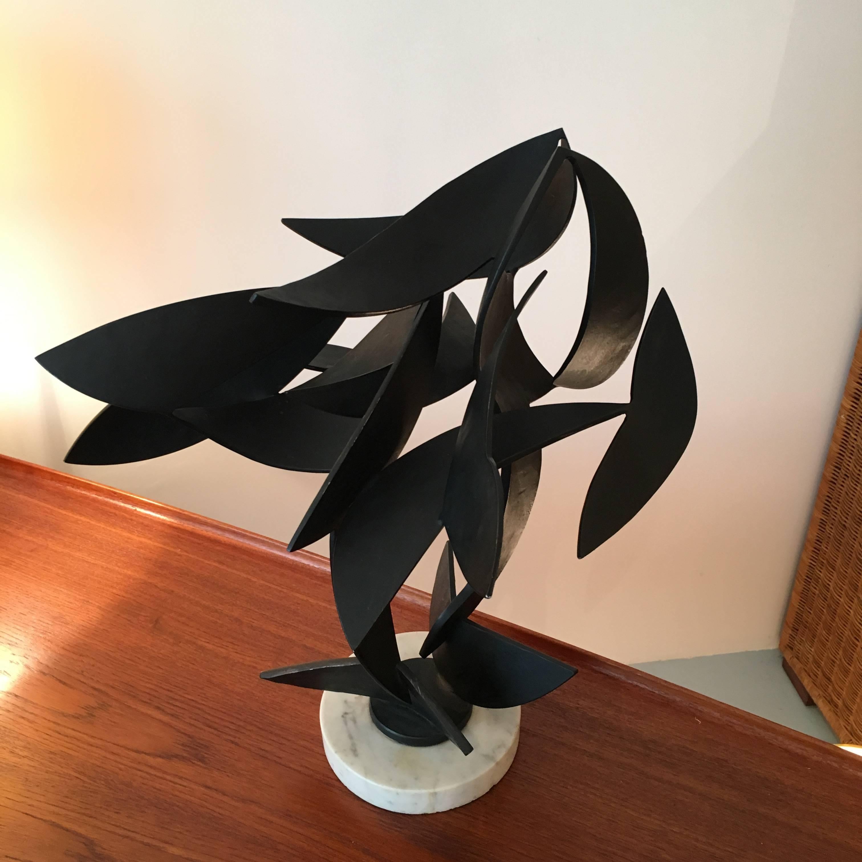 Striking abstract sculpture;
France, circa 1970.
Metal, marble.