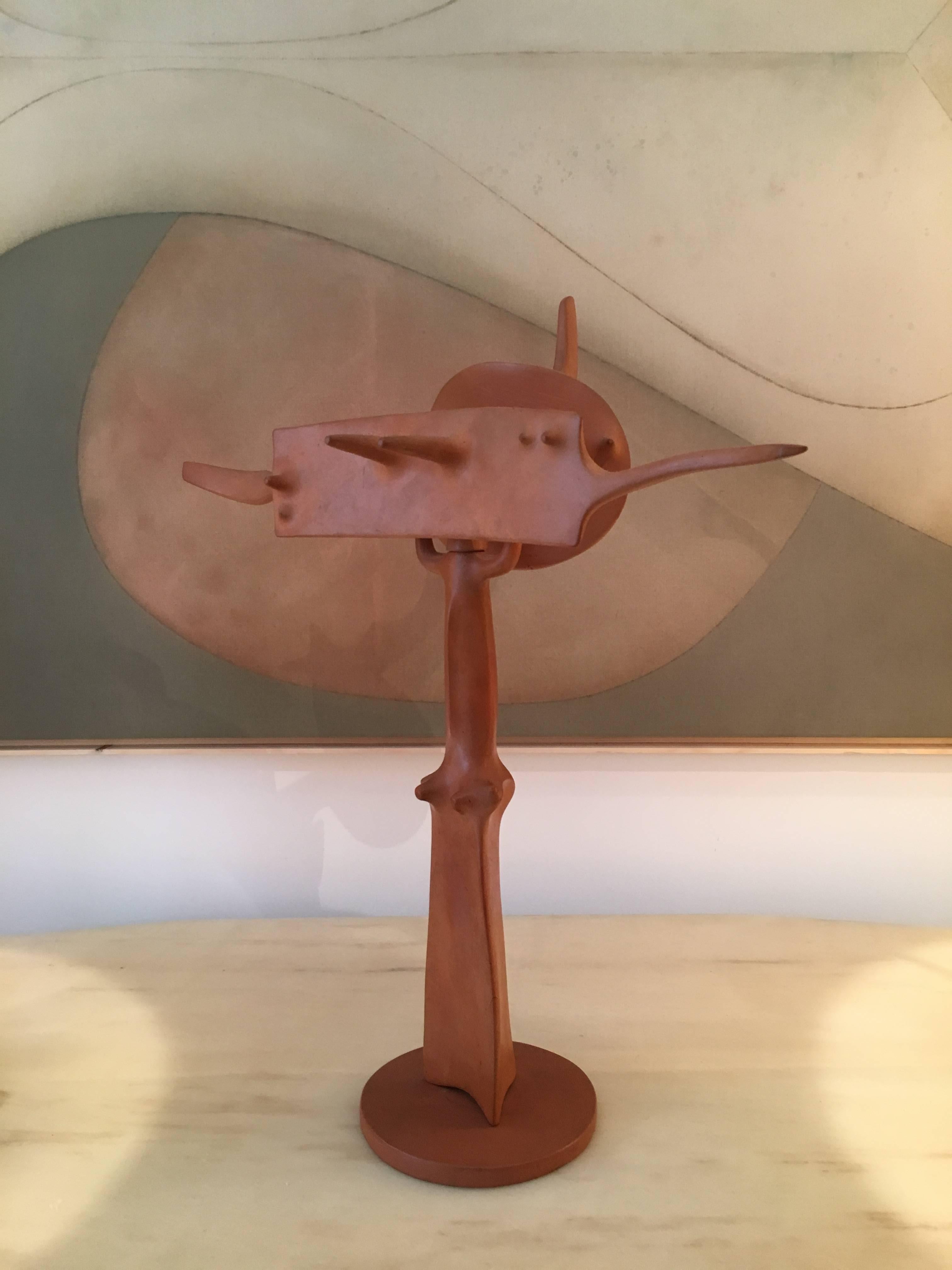 Unique organic sculpture by Victor Roman;
Red terracotta;
Signed on the on the underside.
  