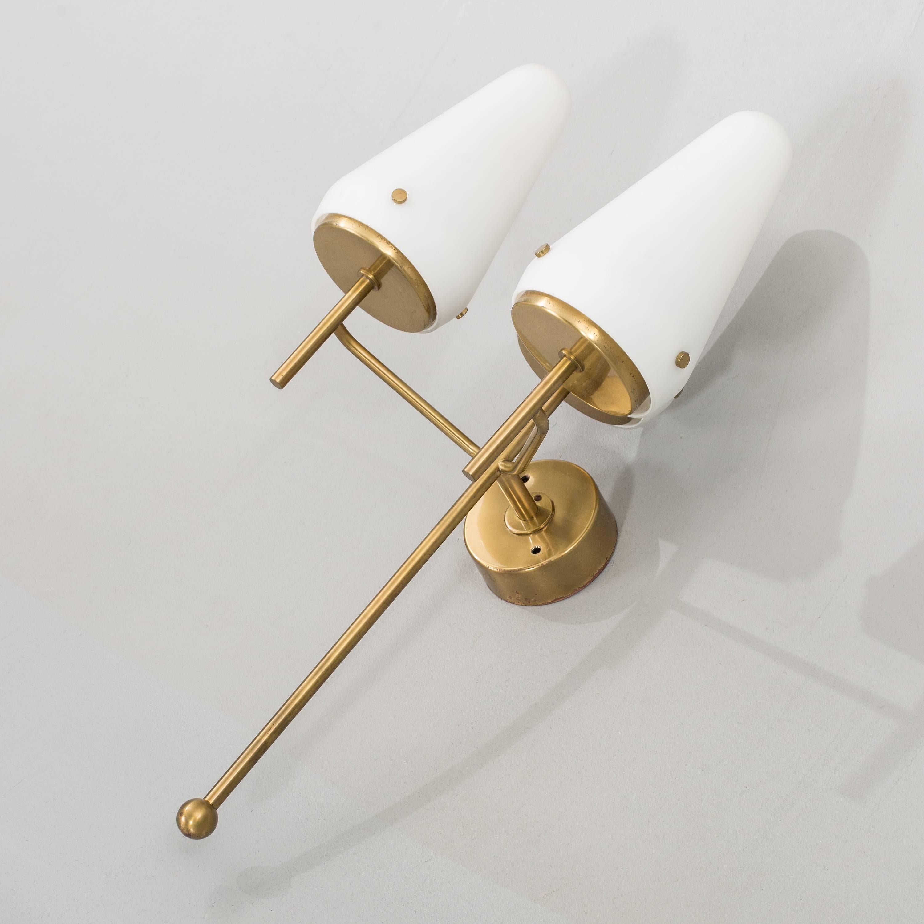Rare and large wall light by Hans-Agne Jakobsson;
Sweden, circa 1960;
Brass; opaline glass.