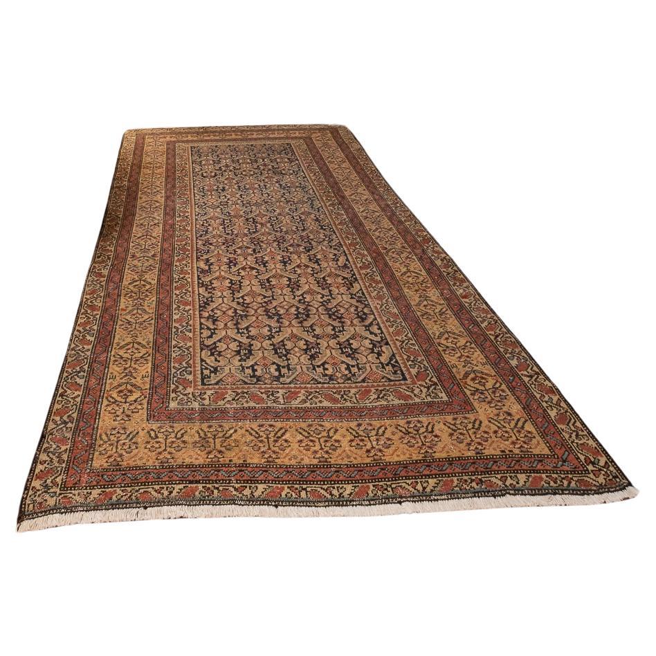 Exquisite Persian Malayer – Timeless Elegance in Every Detail

Let the timeless beauty of this Antique Persian Malayer rug envelop your home with its delicate elegance. Featuring a navy background and soft pastel hues of beige, green, and red, this