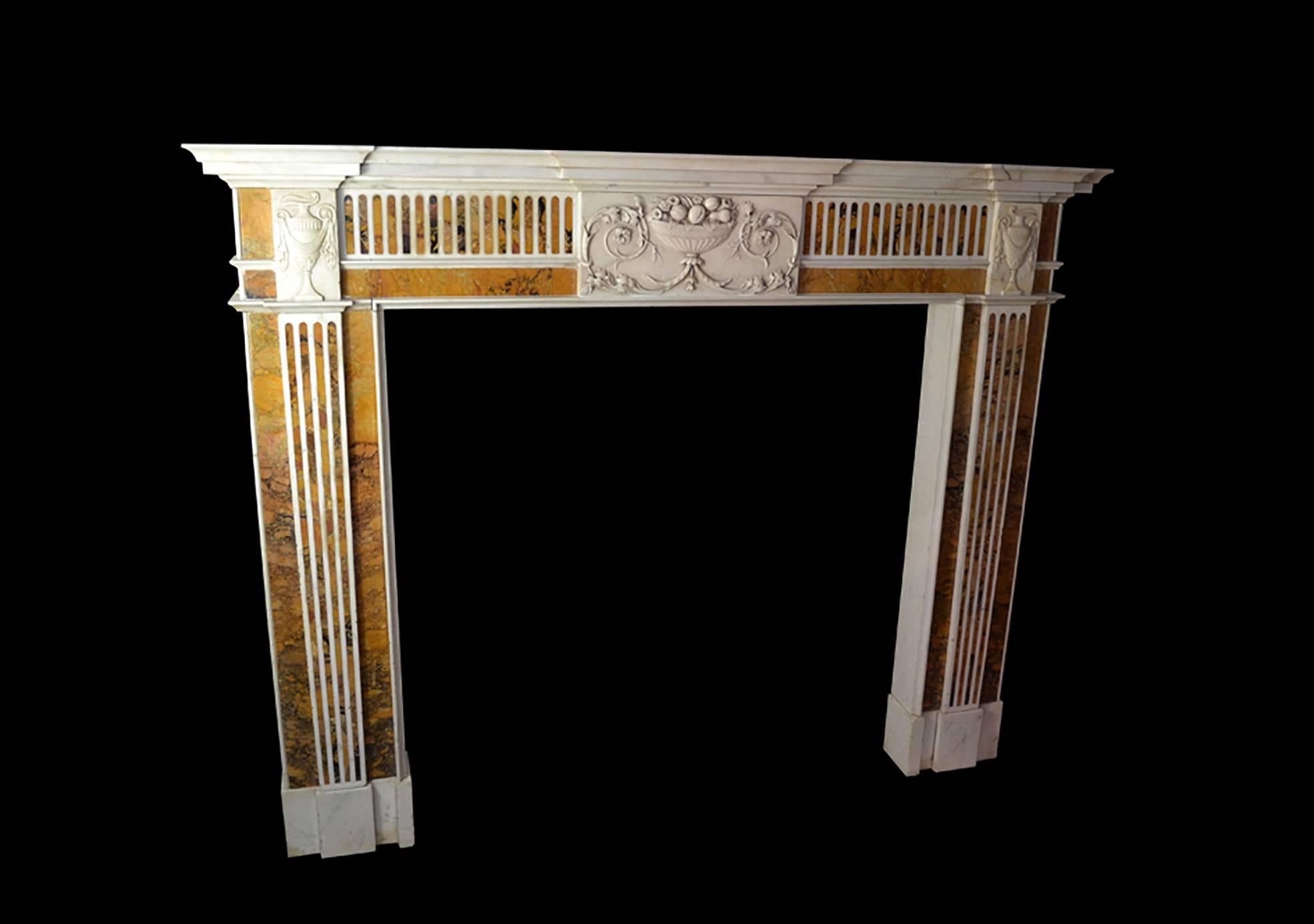 Carved 18th Century Irish Chimneypiece in Statuary Marble with Convent Siena Marble For Sale