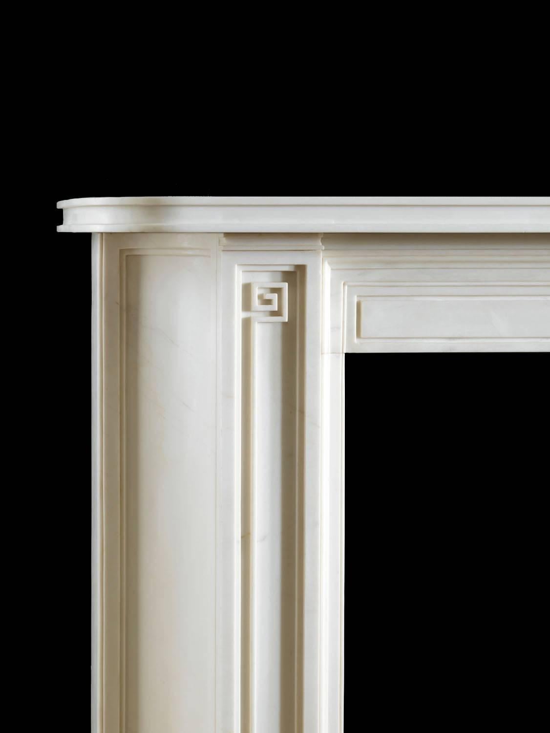 The Soane Pattern IV exemplifies Soane's unique ability to re-interpret classical form and produce a design of stunning modernity. The inverted bow to the pilasters and stylized Greek Key motif could only have been conceived by Soane. The mantel was