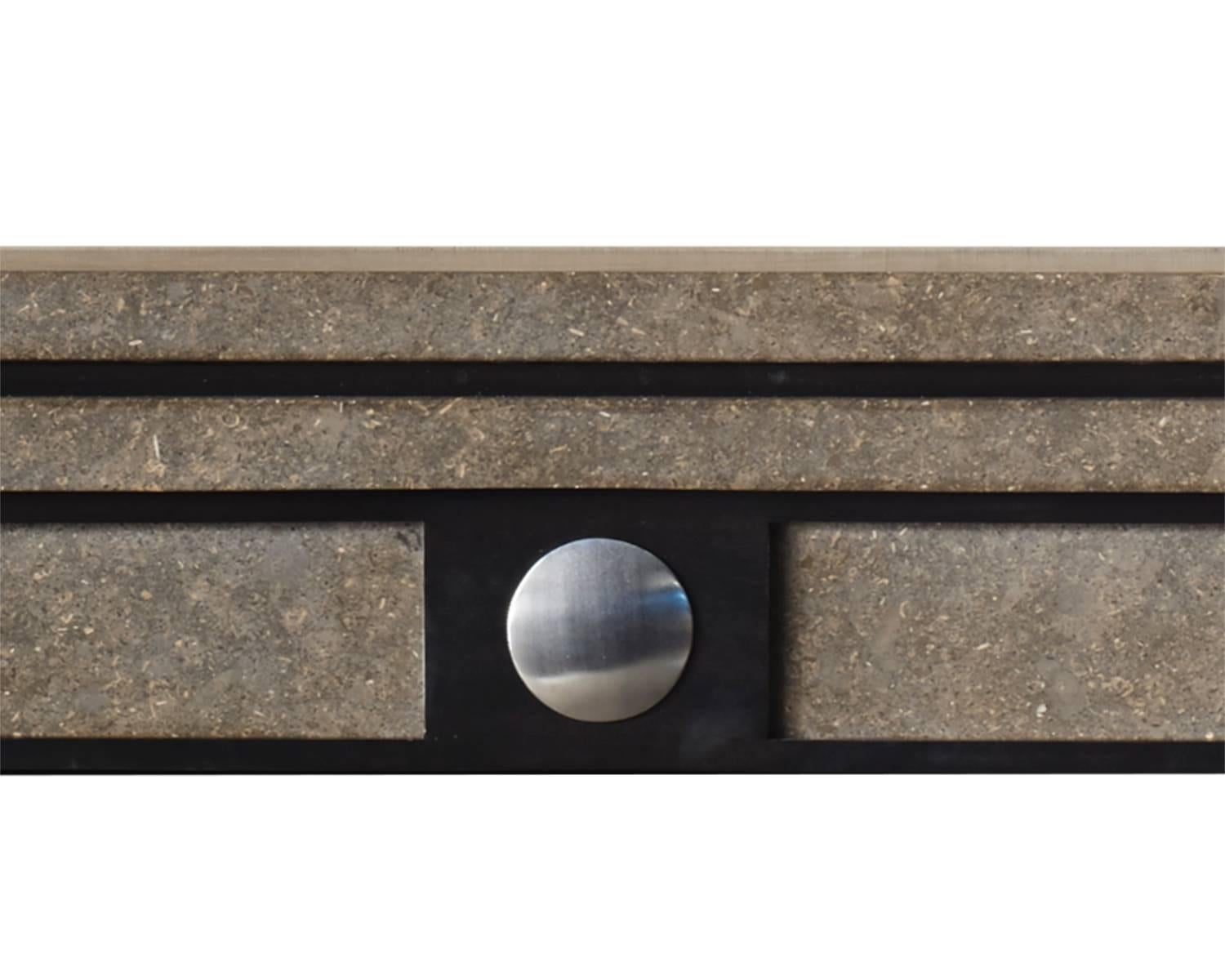 Eric Cohler’s Glasgow: Combining Azul Valverde limestone with patinated and polished steel elements, the design of this surround bears a strong similarity to the work of the visionary architect Sir John Soane.

Opening dimensions: 40