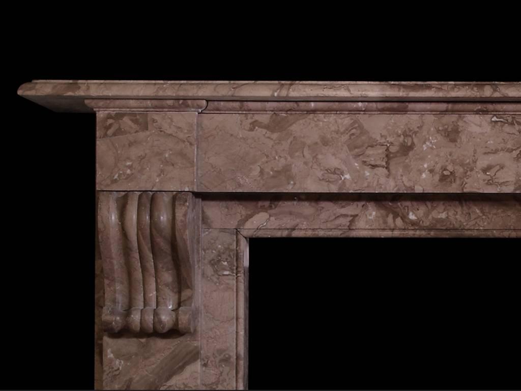 A substantial late 19th century Belgian marble mantel with plain jambs and frieze, the former with a moulded corbel beneath plain corner blocks (FR-ZE44).

Opening dimensions: 38.25