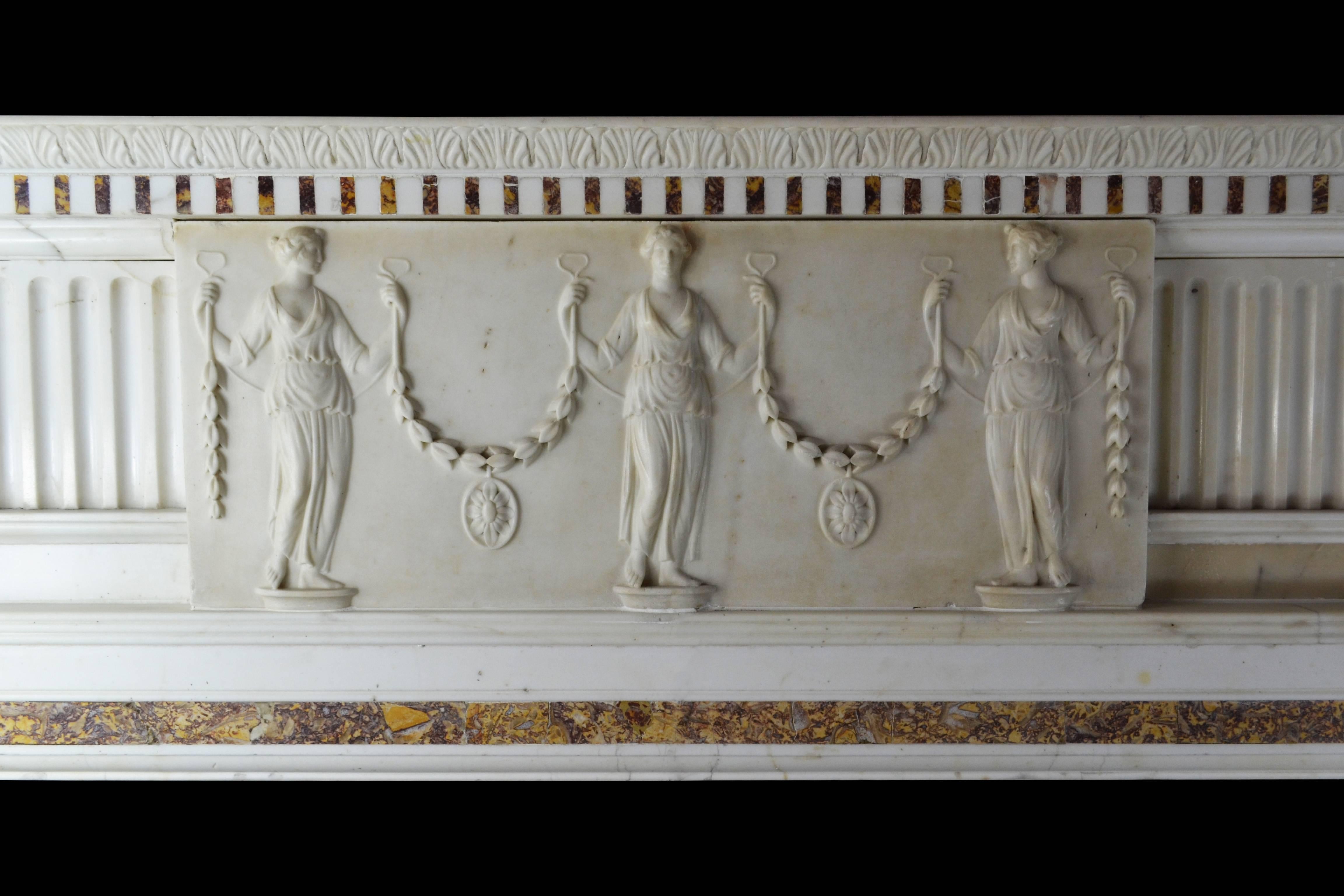 A late 18th century English marble mantel of good quality and in good condition incorporating unrelated 18th century elements of similar quality and even date.

In Italian Statuary with inlays of Spanish Brocatella marble to the pilasters,