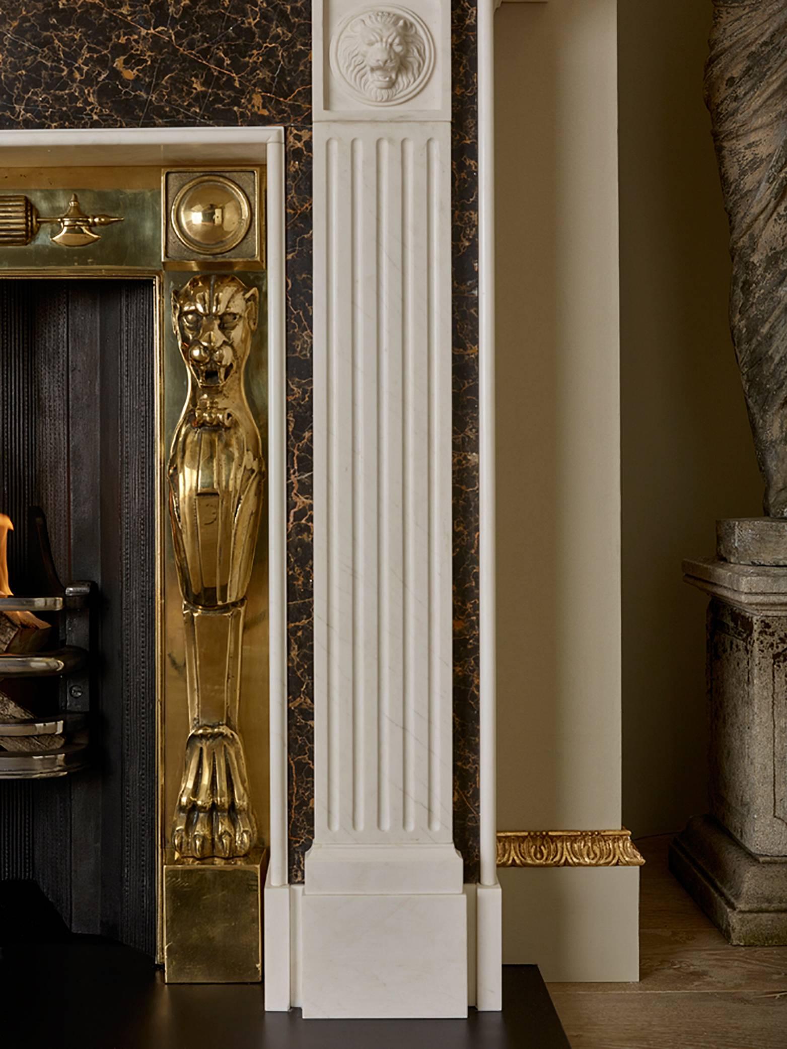 Inspired by the Grand Tour, the renowned British furniture and interior designer Tim Gosling has created this dramatic mantel and register grate for Chesney’s.

The Rome mantelpiece features finely carved Lion masks in the corner blocks and fluted