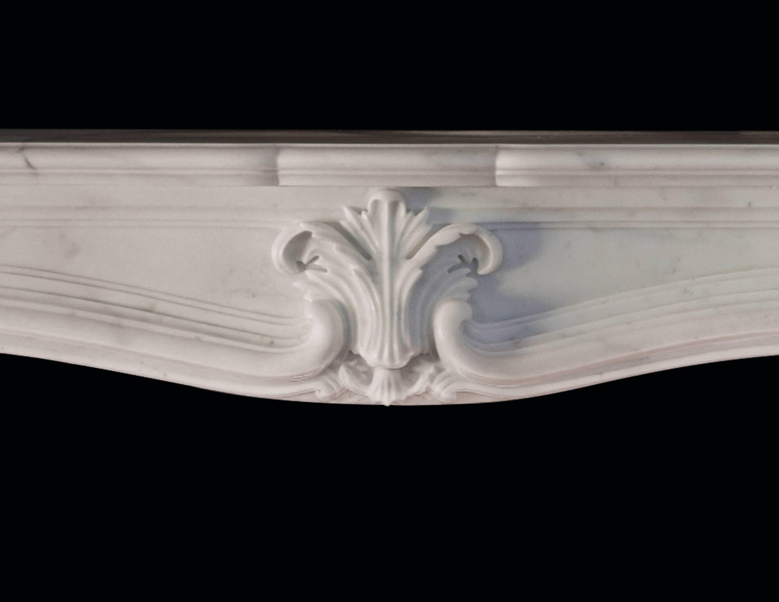 A Louis XV style mantel with Rococo influences. La Rochelle displays delicate carved detail beneath a serpentine shelf.

Opening dimensions: 44 1/2