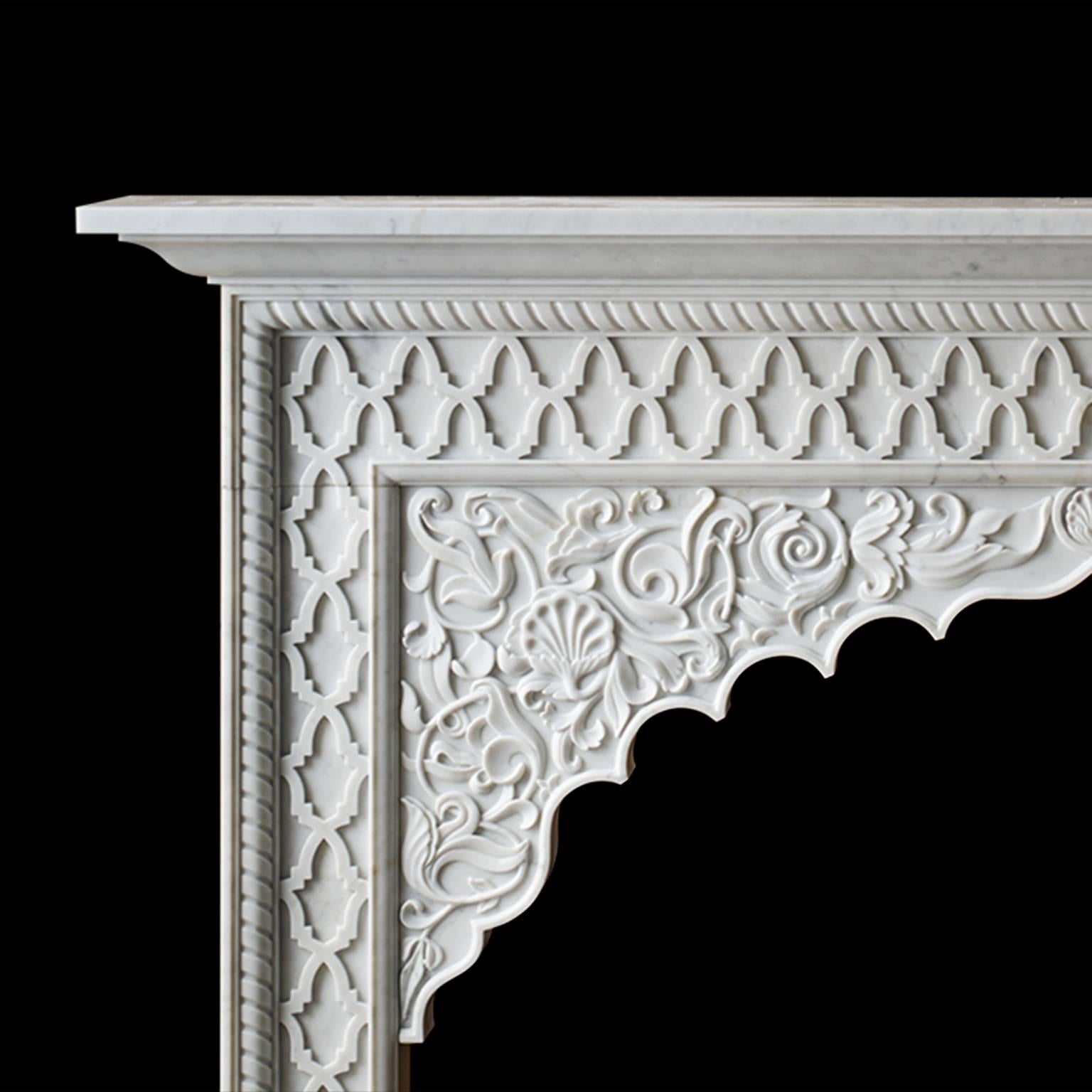 The Sammezzano, from Chesney's Alexa Hampton collection. Inspired by the Moorish architecture of the Castle of Sammezano in Tuscany, this mantelpiece is hand-carved in Carrara marble with interlacing lattice work, floral embellishment, and a