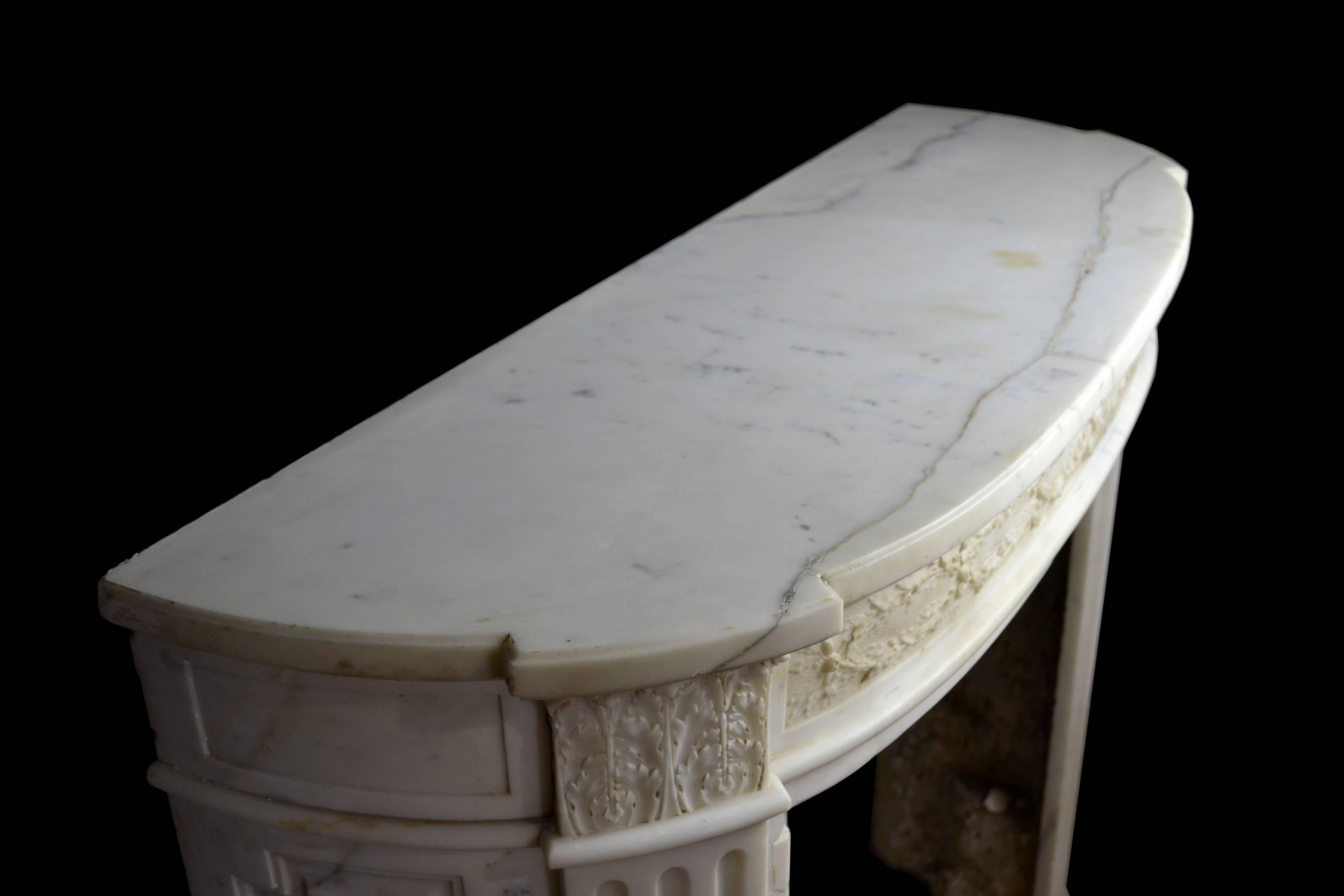 French Statuary Marble Bow Fronted Louis XVI Style Mantel with Fluted Jambs For Sale