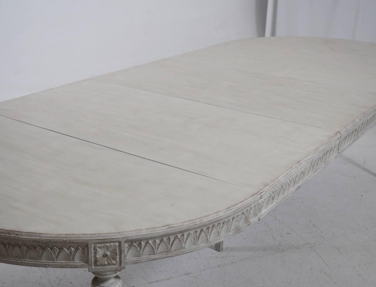 Swedish Gustavian Style Three-Leaf Extension Dining Table with Carved Apron In Excellent Condition In Wichita, KS