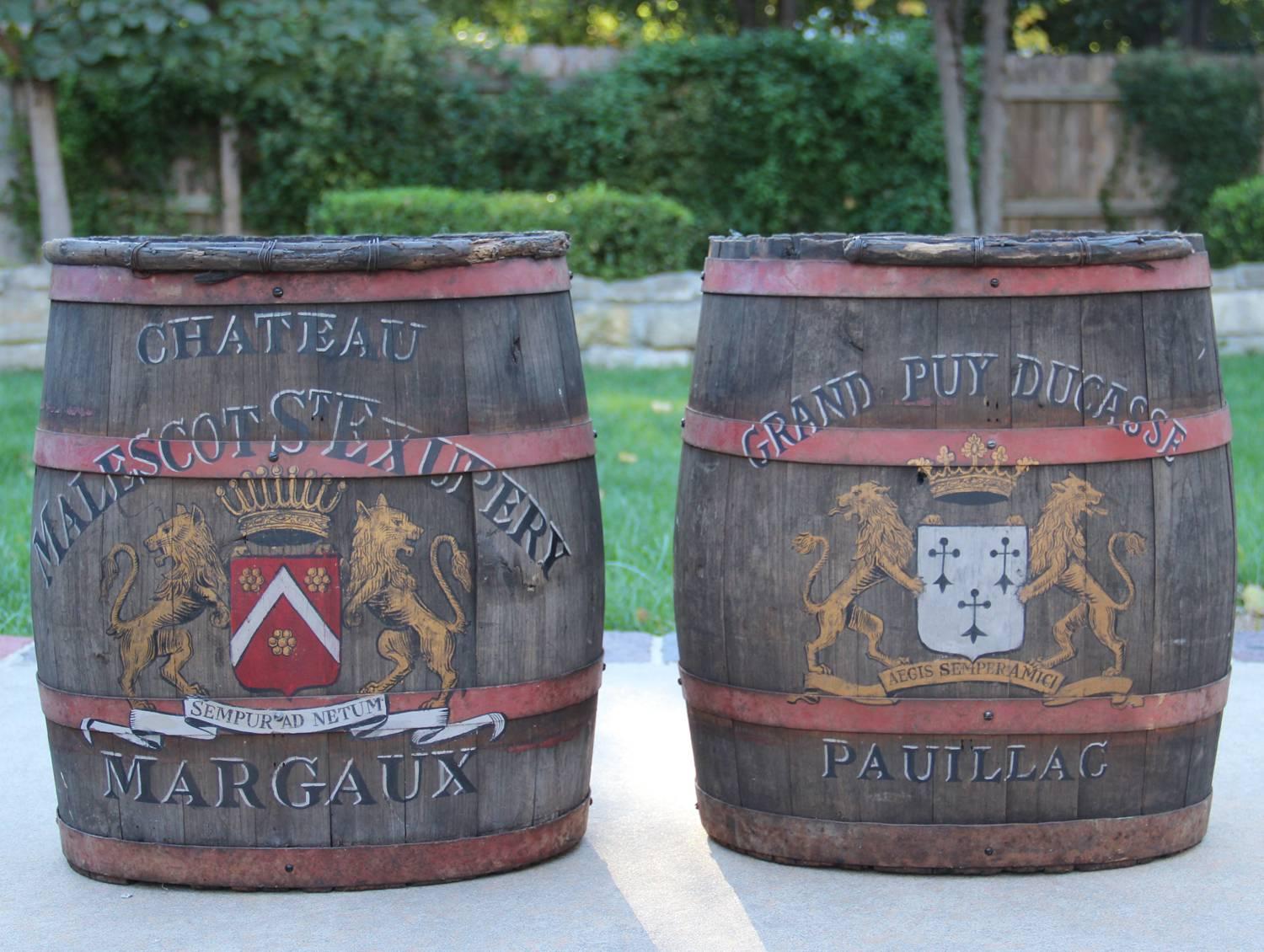 Sold separately.

Late 19th century French grape hods with metal straps and handle. These beautiful French grape hods were once used to pick grapes. The hod on the left features the famous Château Malescot St. Exupéry vineyard cote of arms from the