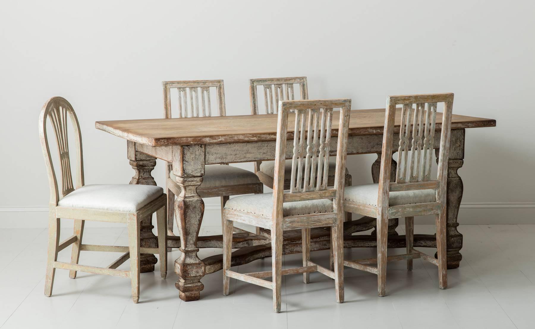 A versatile 18th century Swedish European oak table in two parts from the Baroque period. This exceptional table would make a beautiful dining table, center table for a hall, or writing desk for a library. Seats six comfortably.