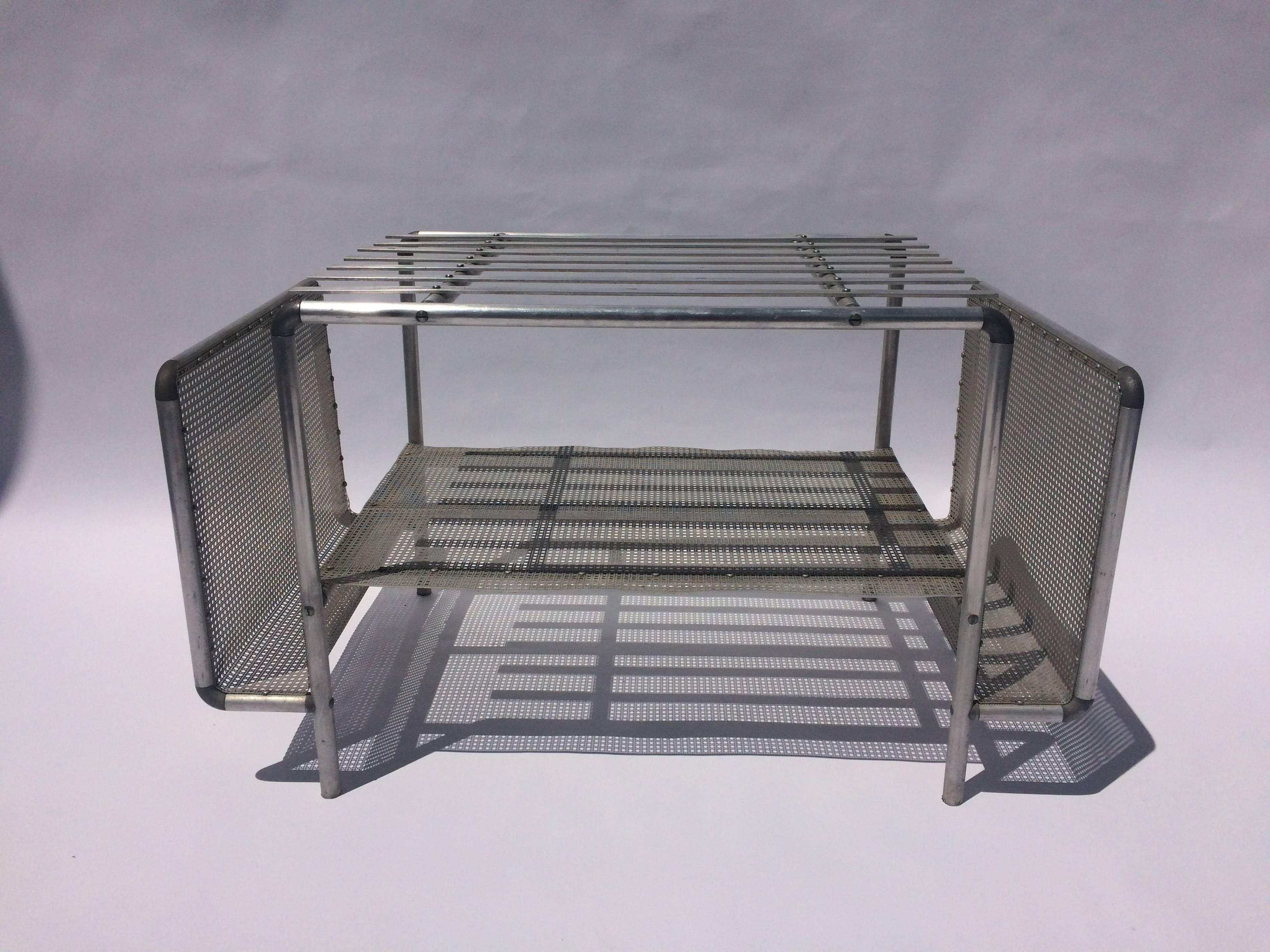 One of a kind table fabricated from aluminium, envoaking a streamline design from the mid-20th century.