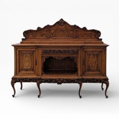 Continental Walnut Carved Sideboard Cabinet with Sculptural Apron