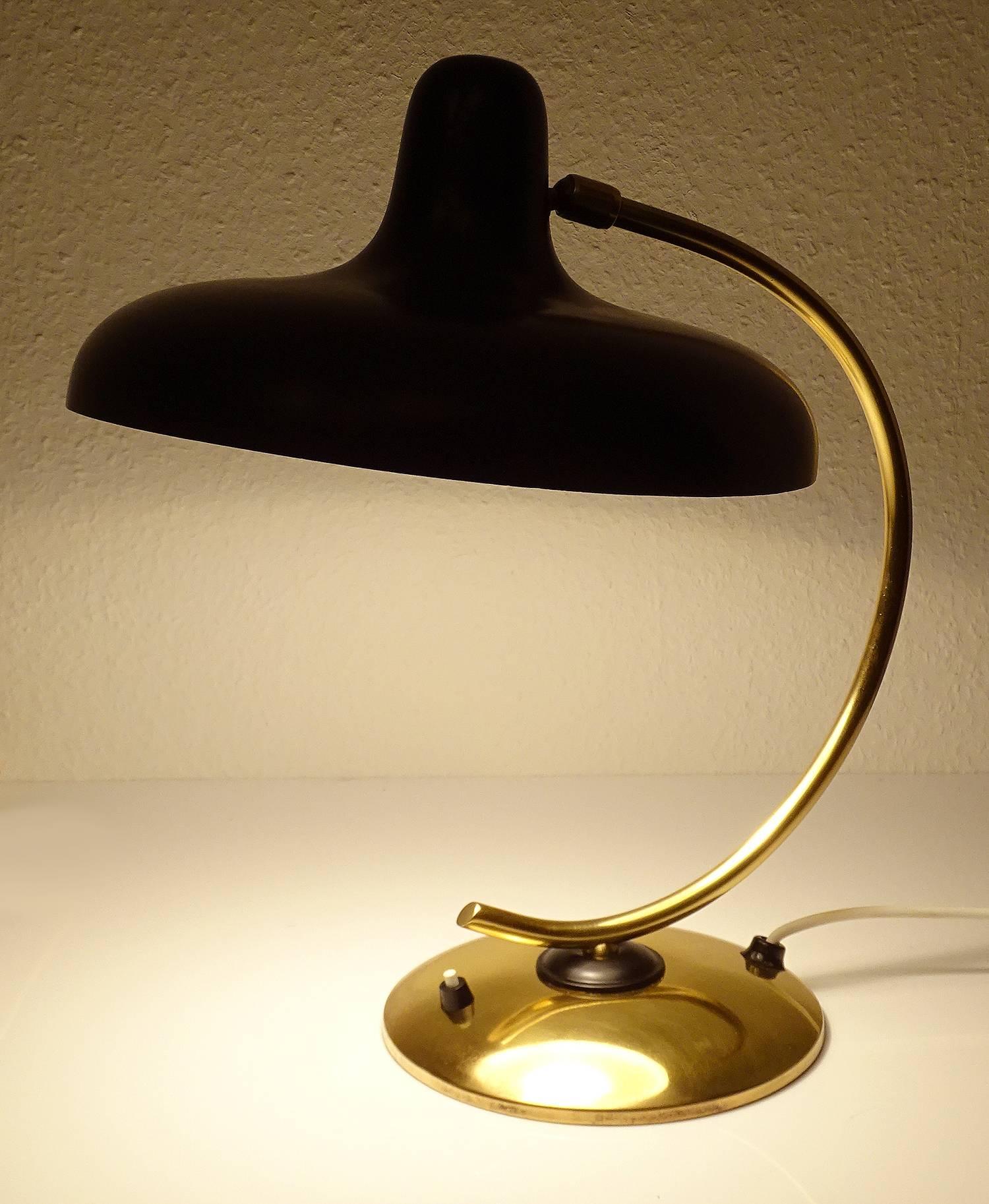 All our light´s electricals are professionally checked and tested for worldwide use
Large Lumen Italia desk lamp, circa 1955, brass and black enameled structure
16.54 in H x 11.81 in W x 15.35 in D
42 cm H x 30 cm W x 39 cm D
One standard size bulb