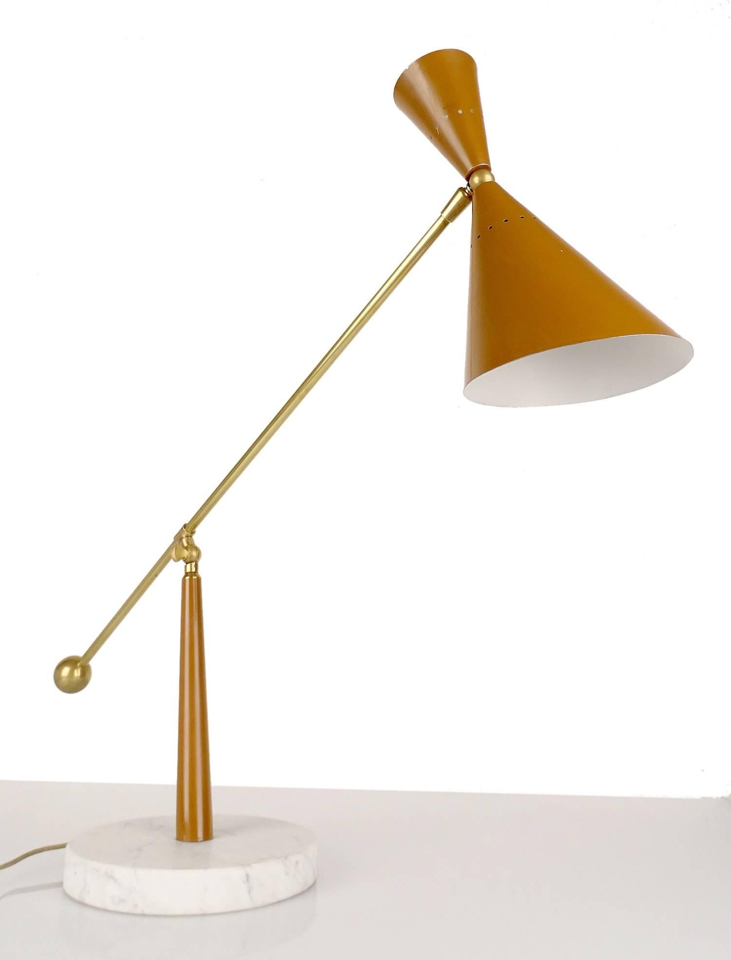 Very large adjustable desk lamp by Stilux Milano, featuring a diabolo double reflector (only bottom is lit up), on a large brass stem with counterweight.
conical enameled support on round streaked marble base

One standard size bulb @ 60 watts,