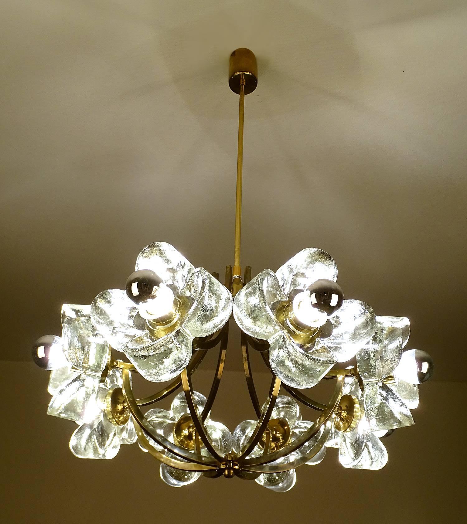 All our lights electricals are checked and tested with 110 and 220 Volts bulbs

Large  chandelier by Simon and Schelle, featuring a basket design brass structure
with eight glass blocks in the shape of a four lobed flower.

Dimensions
27.56 in.H /