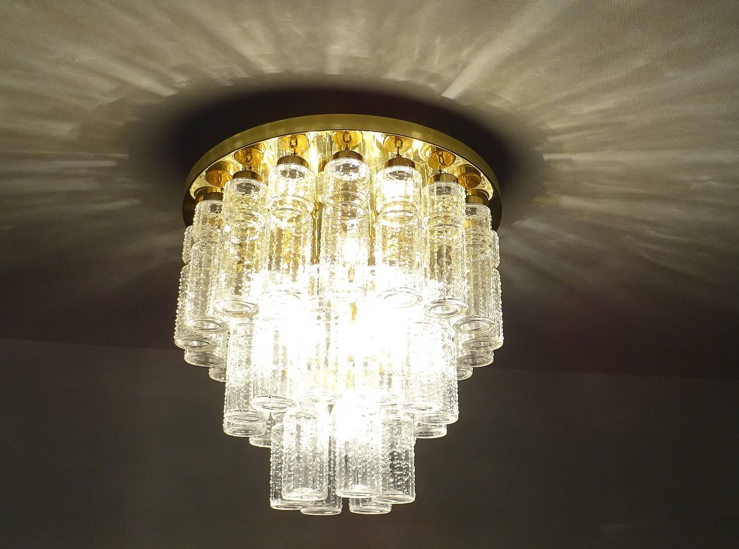 Large Limburg chandelier with blown glass structured pendants on a three tiers structures, Limburg Leuchten received many times the German award for design excellence, IF (Industrieform).
Please require a video of this piece!
Rewired and ready for