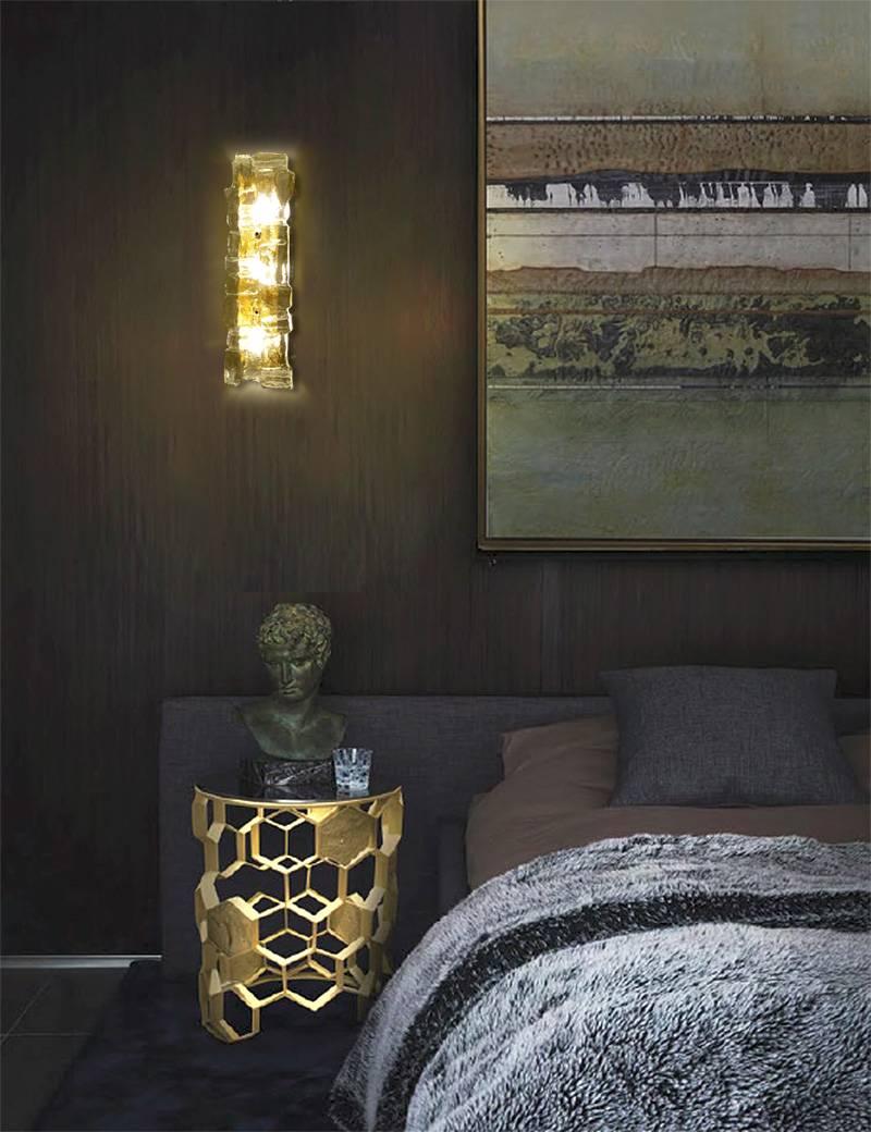 Very large Kalmar sconce, featuring an oversized murano glass panel with a structured brutalist pattern, polished brass base.
20.47 in.Hx5.91 in.Wx4.33 in.D
52 cmHx15 cmWx11 cmD
Three candelabra size bulbs 40 watts 

