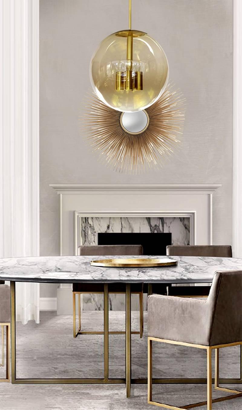Large mid century modern chandelier by Peil and Putzler featuring an oversized glass globe with a light tint, brushed and polished insert brass structure with four lights. 
47.24 in.H / 120 cmH
Diameter
17.72 in. (45 cm)
Four standard size bulbs @