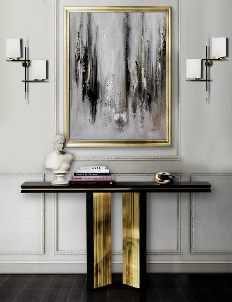 Exceptional pair of very large sconces sold by  Paris Manufacturer Lunel, designed by Gaston Fossati for Ateliers d'Art d'Uzes, featuring a black enameled architectonic  structure with brass fittings and rectangular opaline glass shades with an