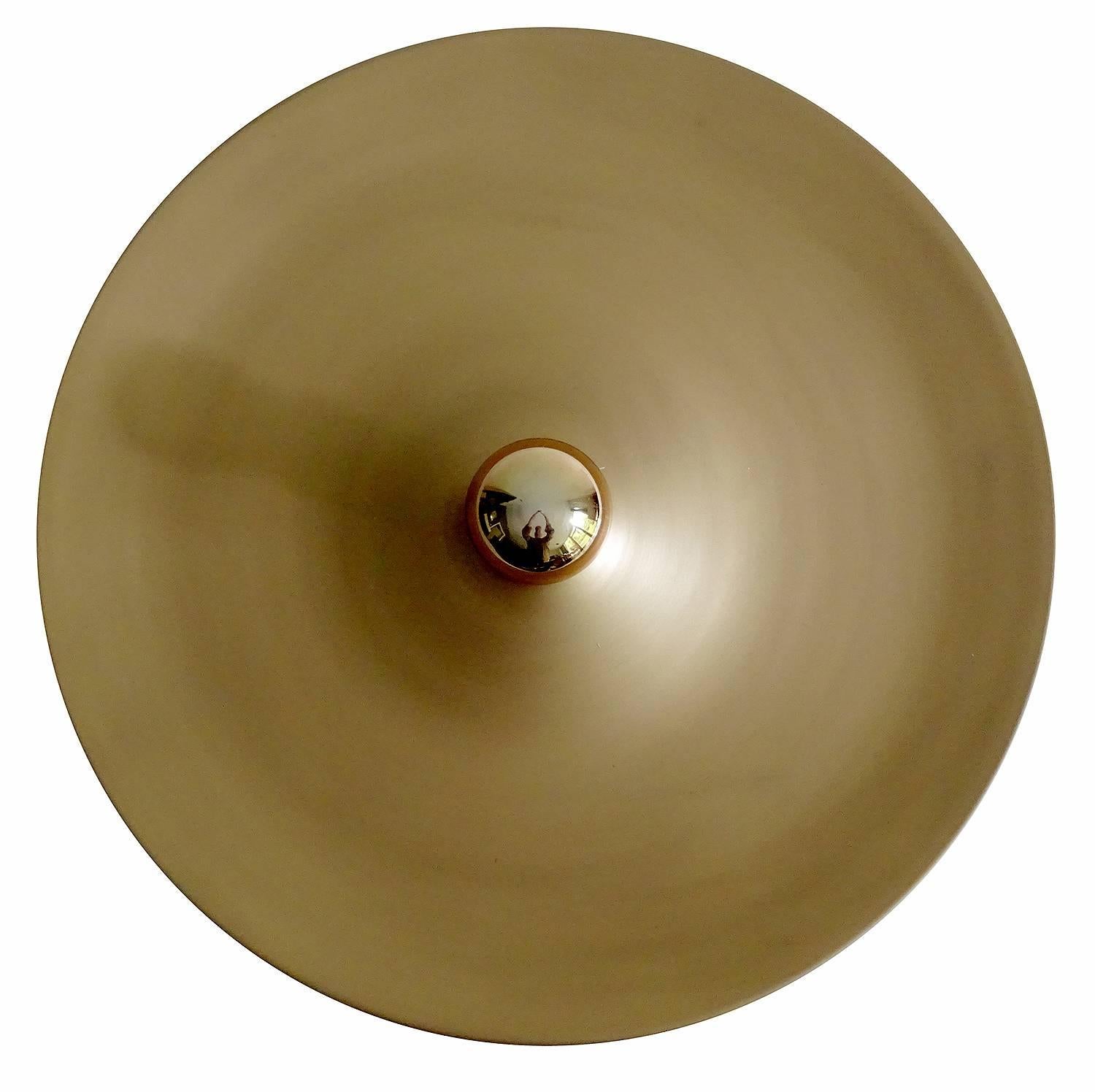 Large mid century modern architectonic sconce, bronze enamel finish. You can experiment in creating the desired atmosphere by using different bulbs: mirrored ones generate a larger ‘clair-obscur’ effect, providing your entry hall with a prestigious