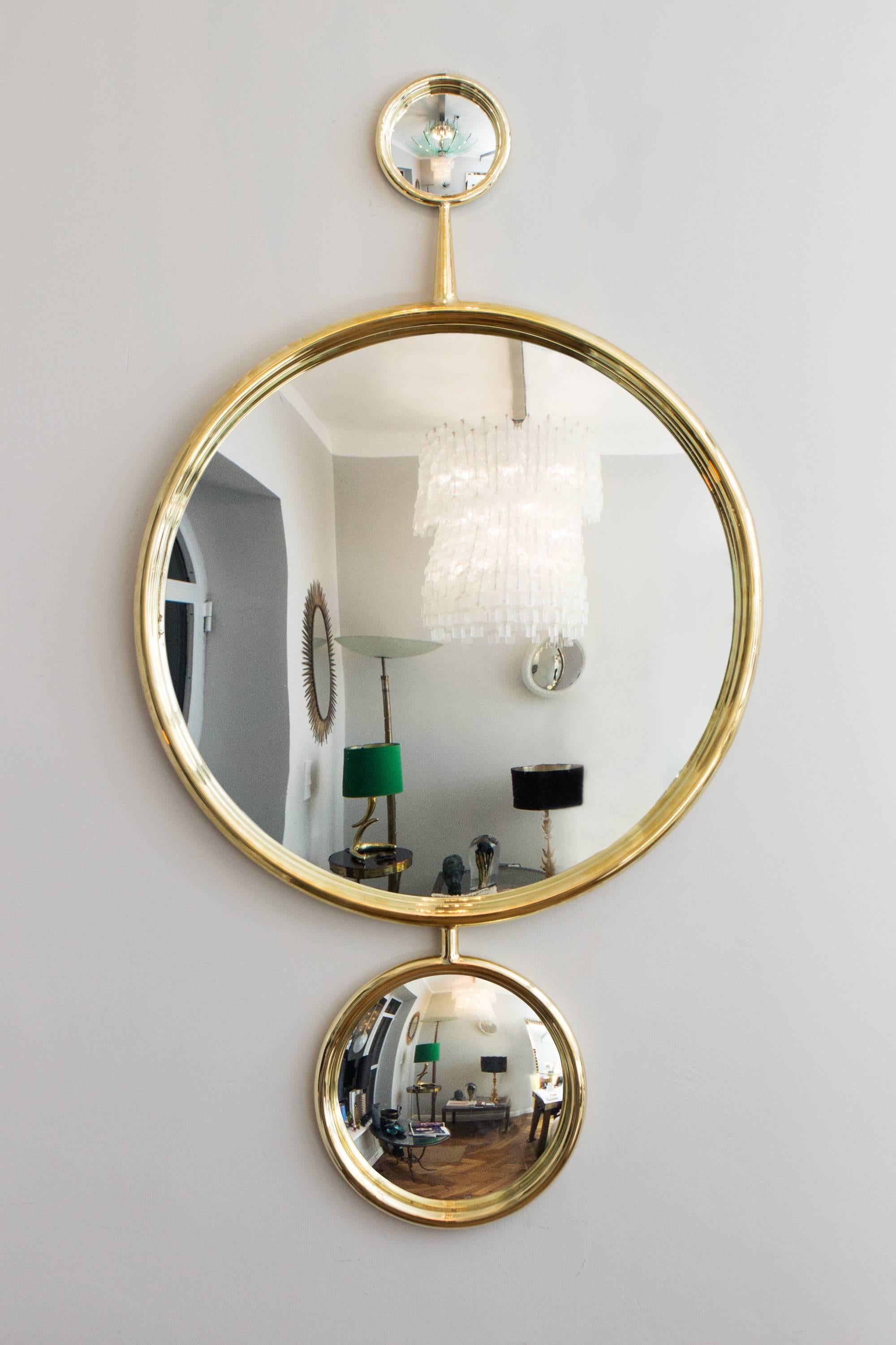 Big convex glass mirror object, France circa 1970, three different sizes of convex mirror glass, solid brass framed. Old heavy original mirror glasses.
Backside of the mirrors mounted brass plate. 
Height 145 cm/ 57 inch / diameter 77 cm/ 30,31
