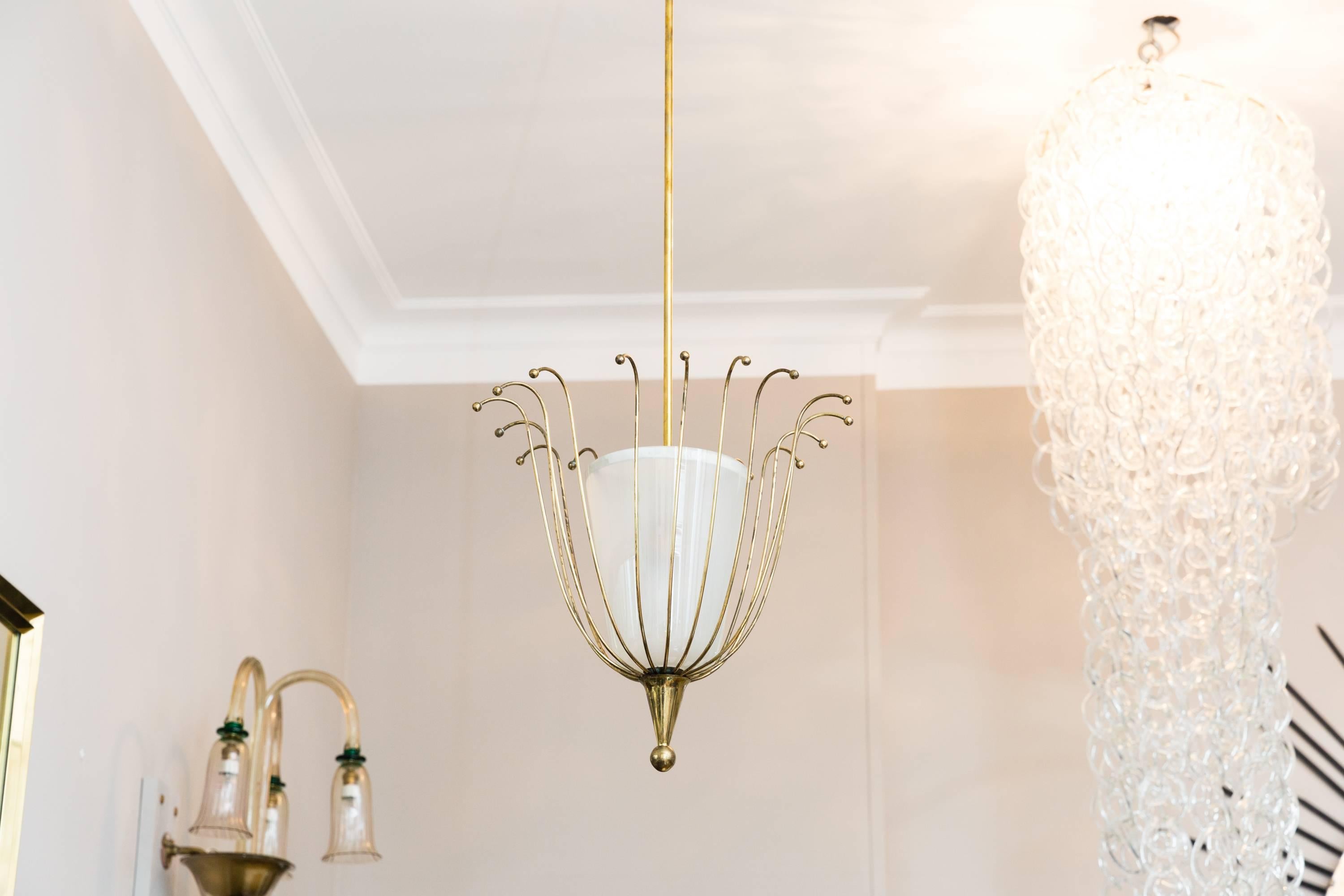 Elegant small chandelier Vienna, circa 1950, opaline glass, brass basket, brass balls.
Brass canopy, brass rod. Very good vintage condition. Glass are in a very good condition, no chips and scratches, rewired.
Measure: Diameter of the lamp 45 cm,