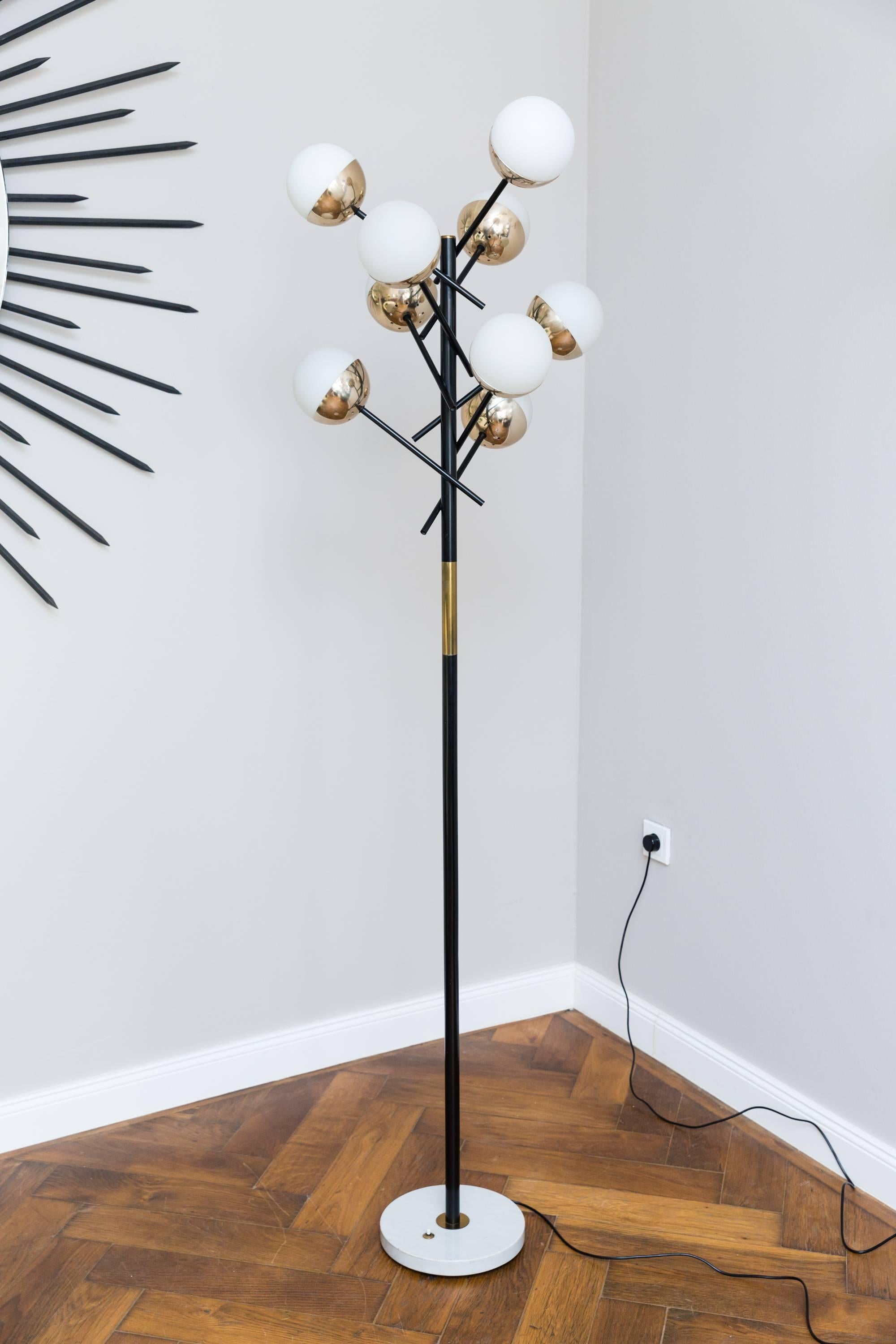 Very elegant and rare floor lamp by Stilnovo, Italy, circa 1955, enamelled metal, brass, marble base, nine opal cased glass diffusers. Measures: Height 185 cm, diameter 53 cm, diameter marble base 30 cm, rewired, very good original vintage