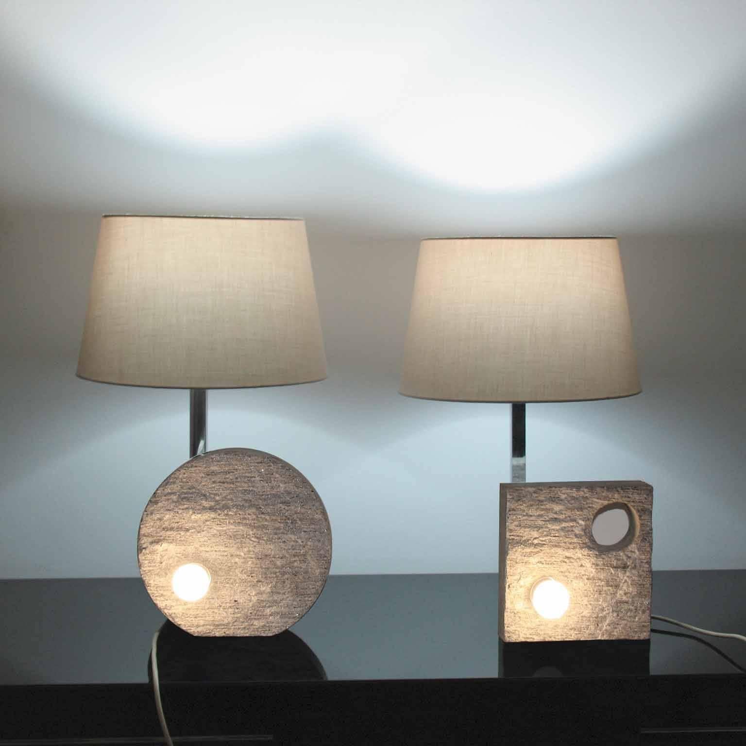 Stone (Portuguese beige granite) bases, hand-carved, with chromed metal details, geometrically shaped.
Double illuminating source, one in front, decorative, one to the top.
Double phase illuminating, can be lit separately the top, the front and