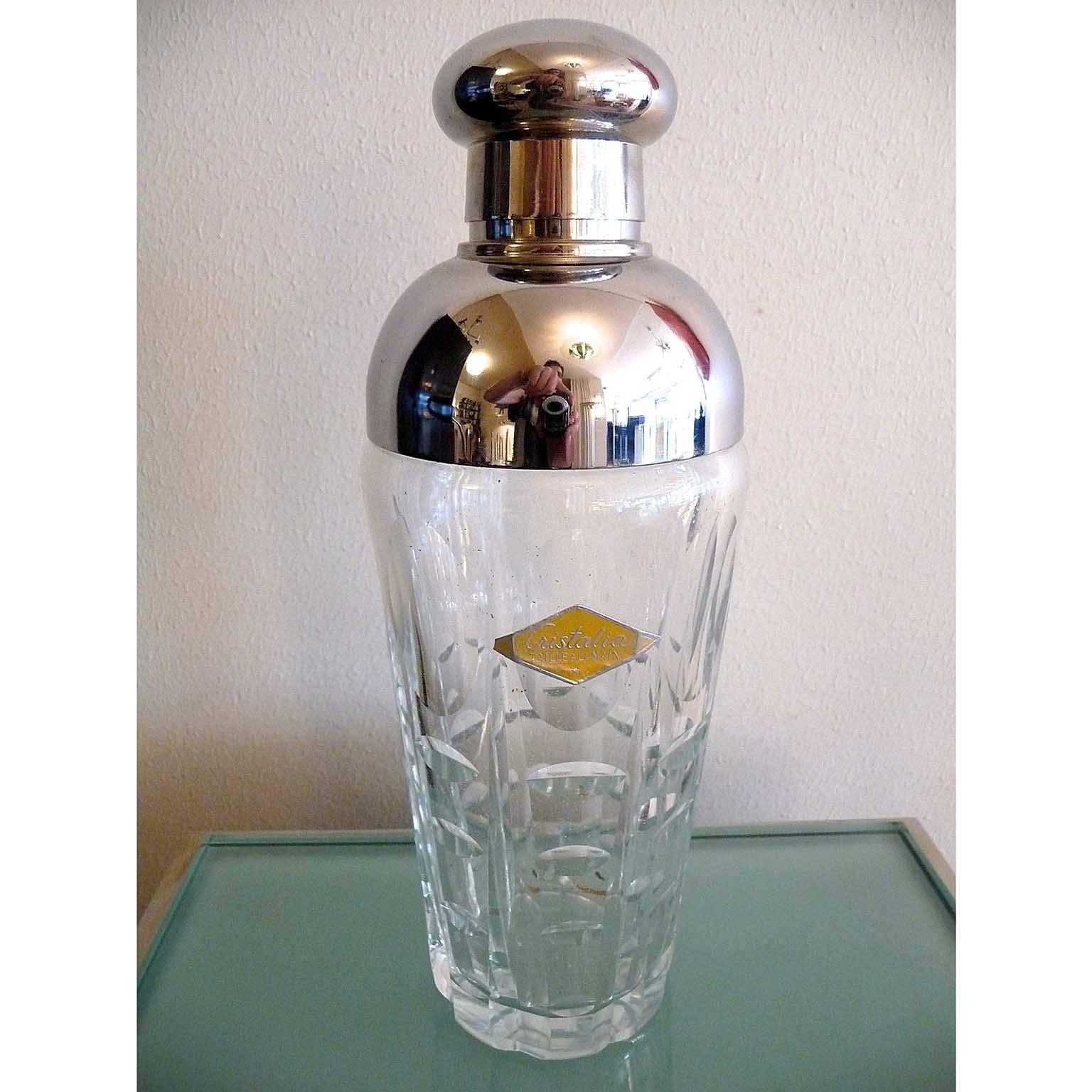 Hand-cut crystal and silvered metal art deco cocktail drinks shaker.
Original label 