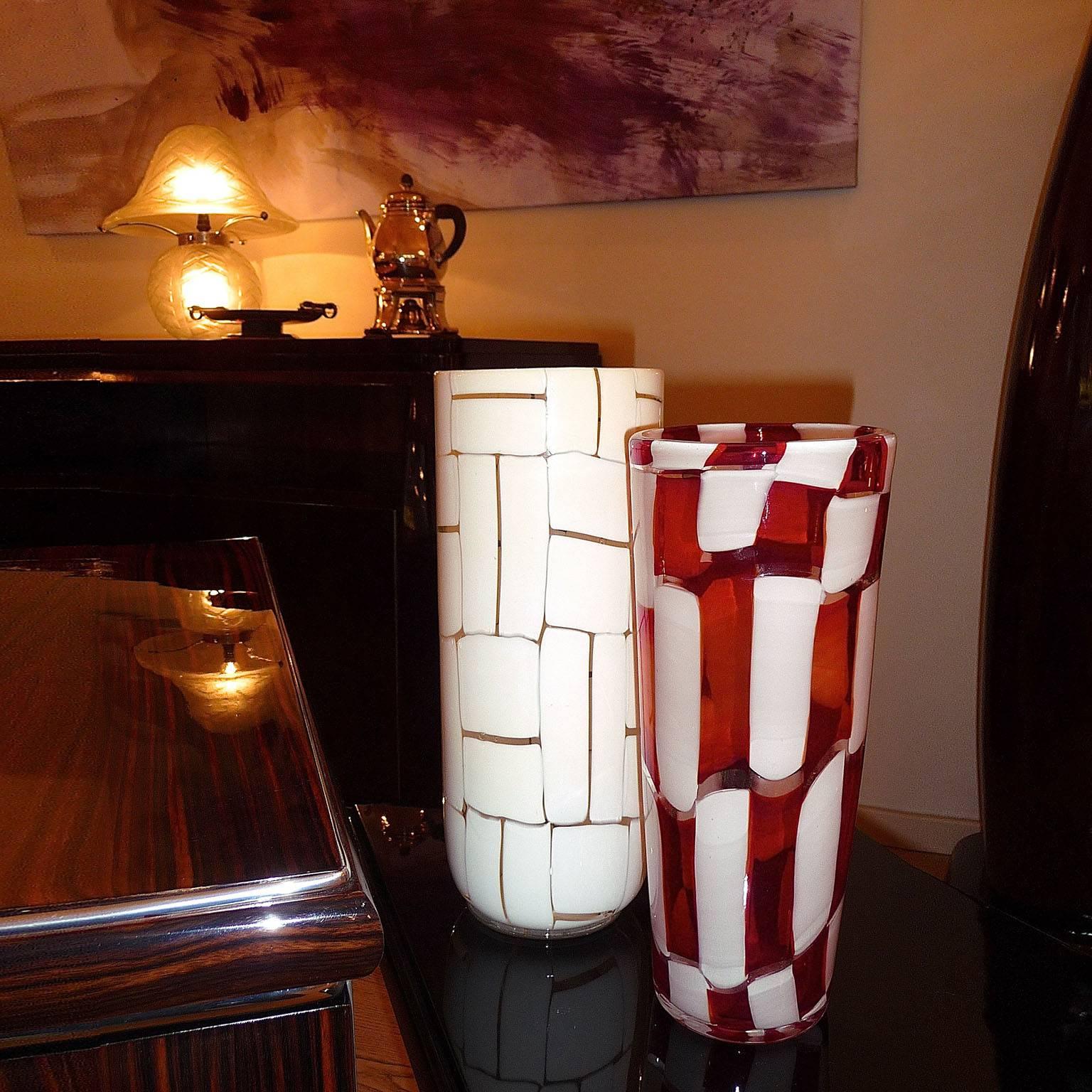 Bicolore glass vase made of white and dark red tessere, fused together in 'pezzato' technique.

Dimensions: Height 31.5 cm (12-1/2 in.)
Excellent condition
Literature: 
 - Ercole Barovier 1889-1974: Vetraio Muranese, Attilia Dorigato, pg.142
