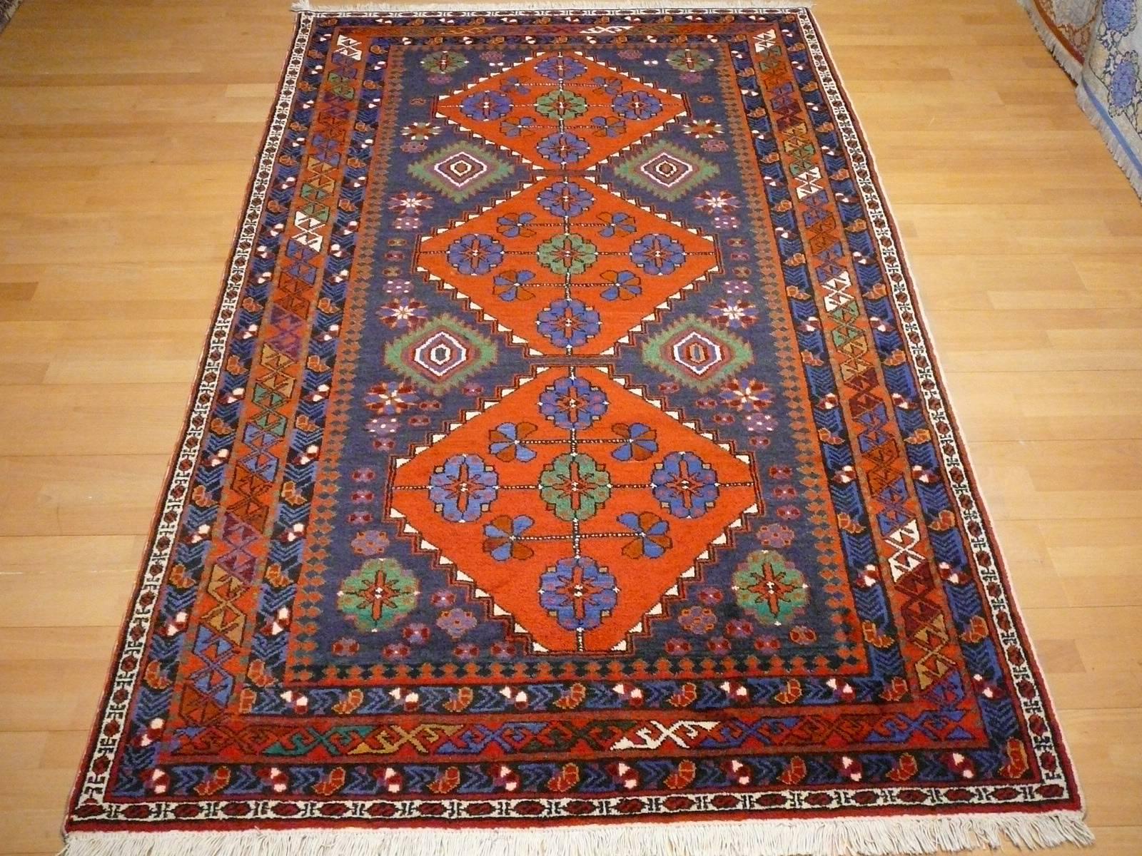Hand-knotted Caucasian Shirvan rug in very good condition. Wool pile on cotton warp.