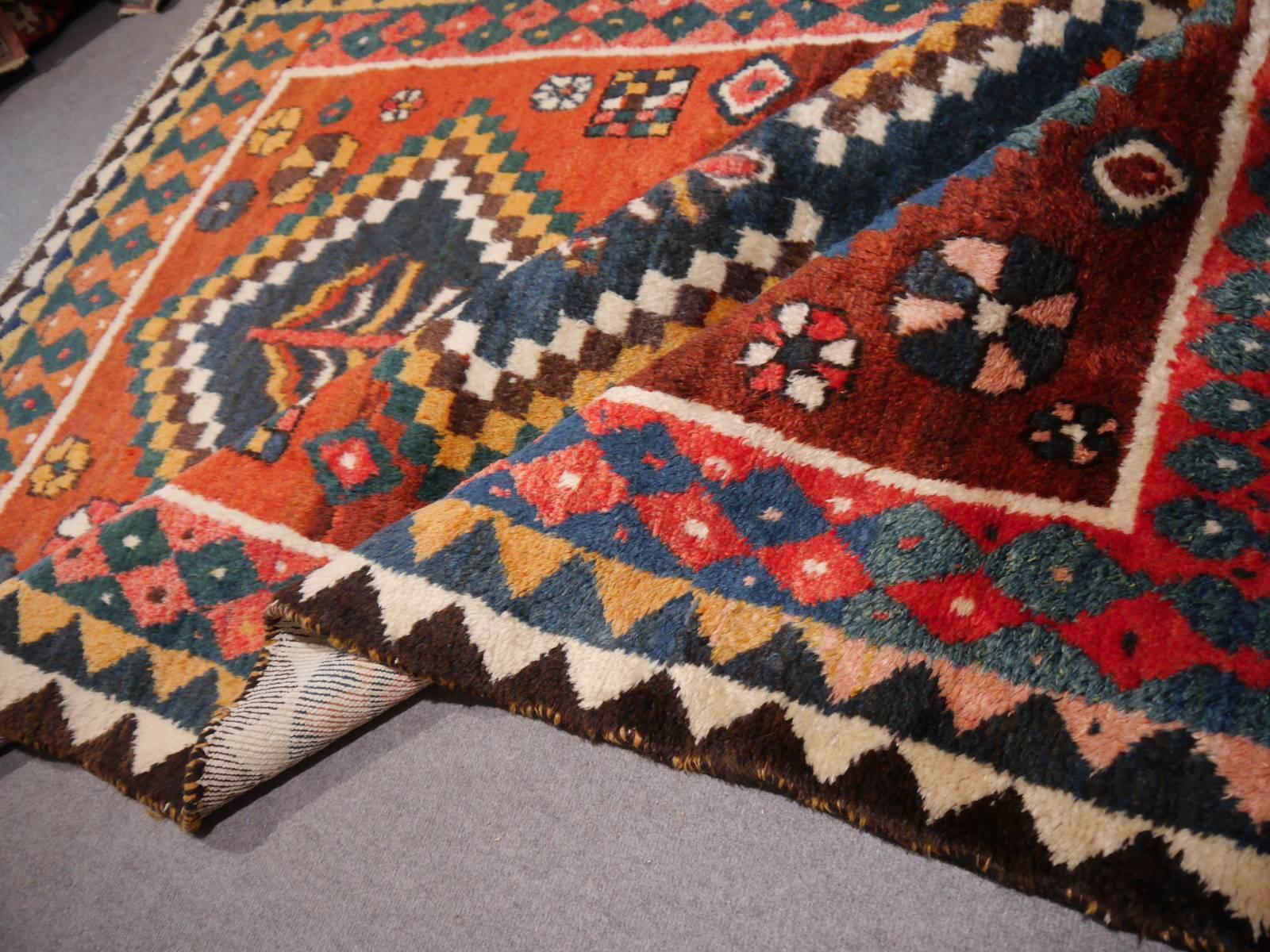 Beautiful vintage/semi antique Mid-Century tribal rug. Hand-knotted in Persia using handspun wool and natural dyes. Think plush pile and wool with beautiful luster. Measures: 7.9 x 5.0 / 240 x 150 cm.