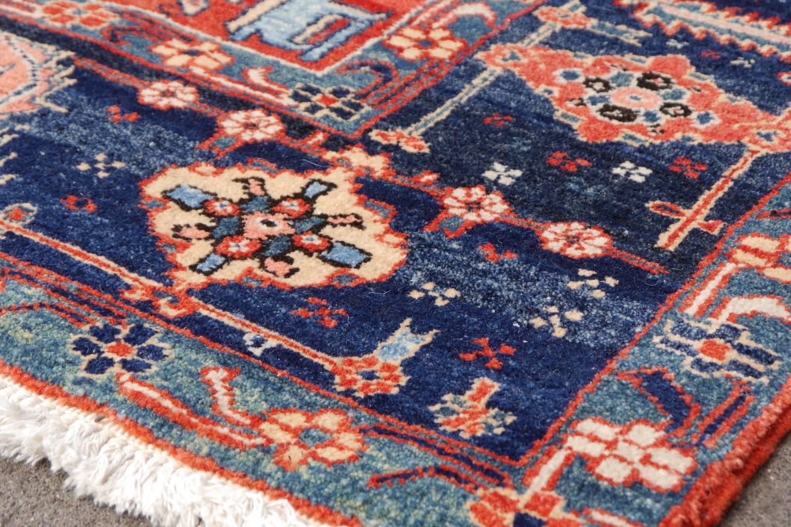 A large sized Azeri Heriz rug. The pile is made of high end quality wool - hand spun, hand dyed with all vegetable dyes and knotted by master weavers. The rug is very dense and heavy, about 65 kg or 142 lb. The condition is exquisite. The rug was