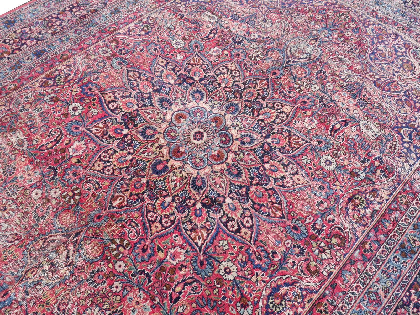 This beautiful hand knotted persian vintage Midcentury rug will make your room look excellent. It is an original from the 1950´s with a one if a kind worn / distressed look, but all edges / selvedge and fringes are in secured and good condition. It