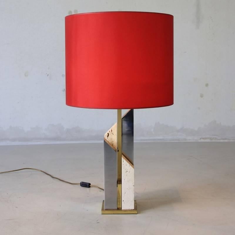 Rare table lamp, designed by Gaetano Sciolari in the 1970s, Italy.

Large table lamp, made of nickel plated metal, sandstone and brass. Stamped 'Sciolari - Rome' on the base. With the original Sciolari silk lamp shade (see last photograph).