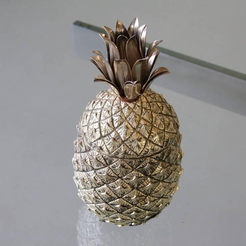Decorative pineapple/ice cooler by Mauro Manetti, Italy, 1970s.

We always have a nice collection of original Mauro Manetti pineapples in stock. They are always stamped.