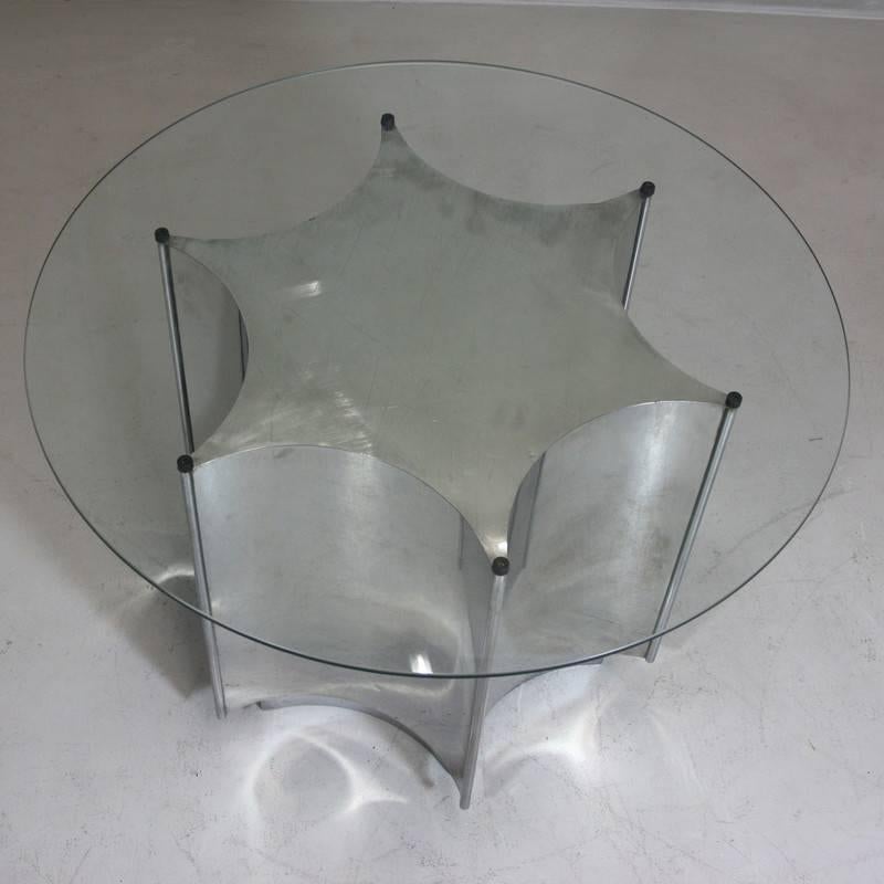 'ROR' coffee table designed by Ringo Starr and Robin Cruickshank, England, late 1960s-early 1970s.

Very rare star-shaped stainless steel coffee table with glass top, designed by the Ringo and Cruickshank for their furniture design company, ROR.