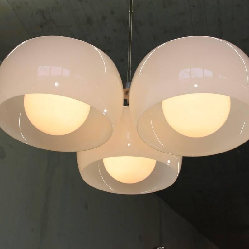 The Triclinio ceiling lamp, designed by Vico Magistretti, Italy, 1961.

Three double diffuser glass shades, opal glass and brushed metal frame. Produced by Artemide, Italy.

Rare with the large size glass! Height including the metal rod 127